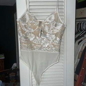 Sheer lace detailed body suit